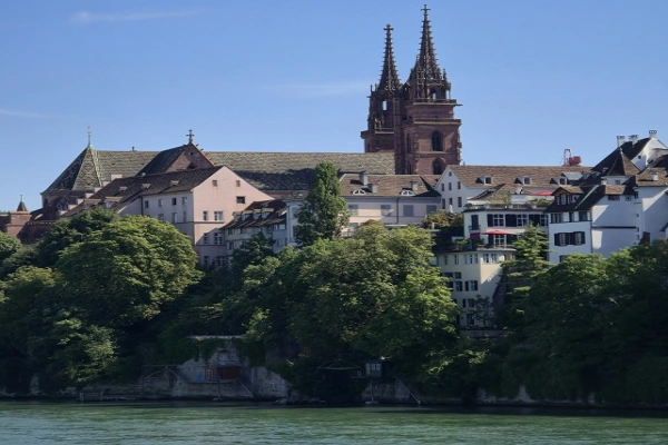 View of Basel Old Town and Basler Münster overlooking the Rhine River in Switzerland