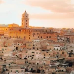 Sassi di Matera cave houses at sunset in Matera Italy, off the beaten path historic town