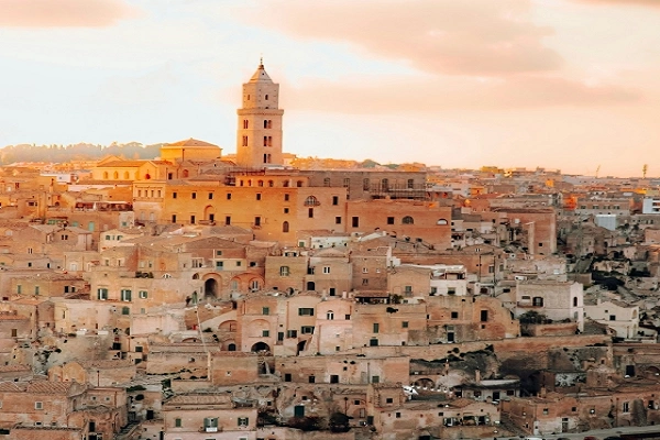 Sassi di Matera cave houses at sunset in Matera Italy, off the beaten path historic town