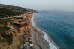 Aerial view of Kroreza Beach Albania with crystal clear blue water and secluded coastline.