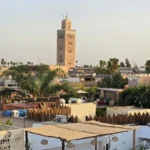 Rooftop view of Marrakech medina with mosque minaret, Morocco travel guide 2026