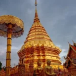 Golden stupa and temple buildings at Wat Phra That Doi Suthep in Chiang Mai, Thailand