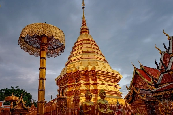 Golden stupa and temple buildings at Wat Phra That Doi Suthep in Chiang Mai, Thailand